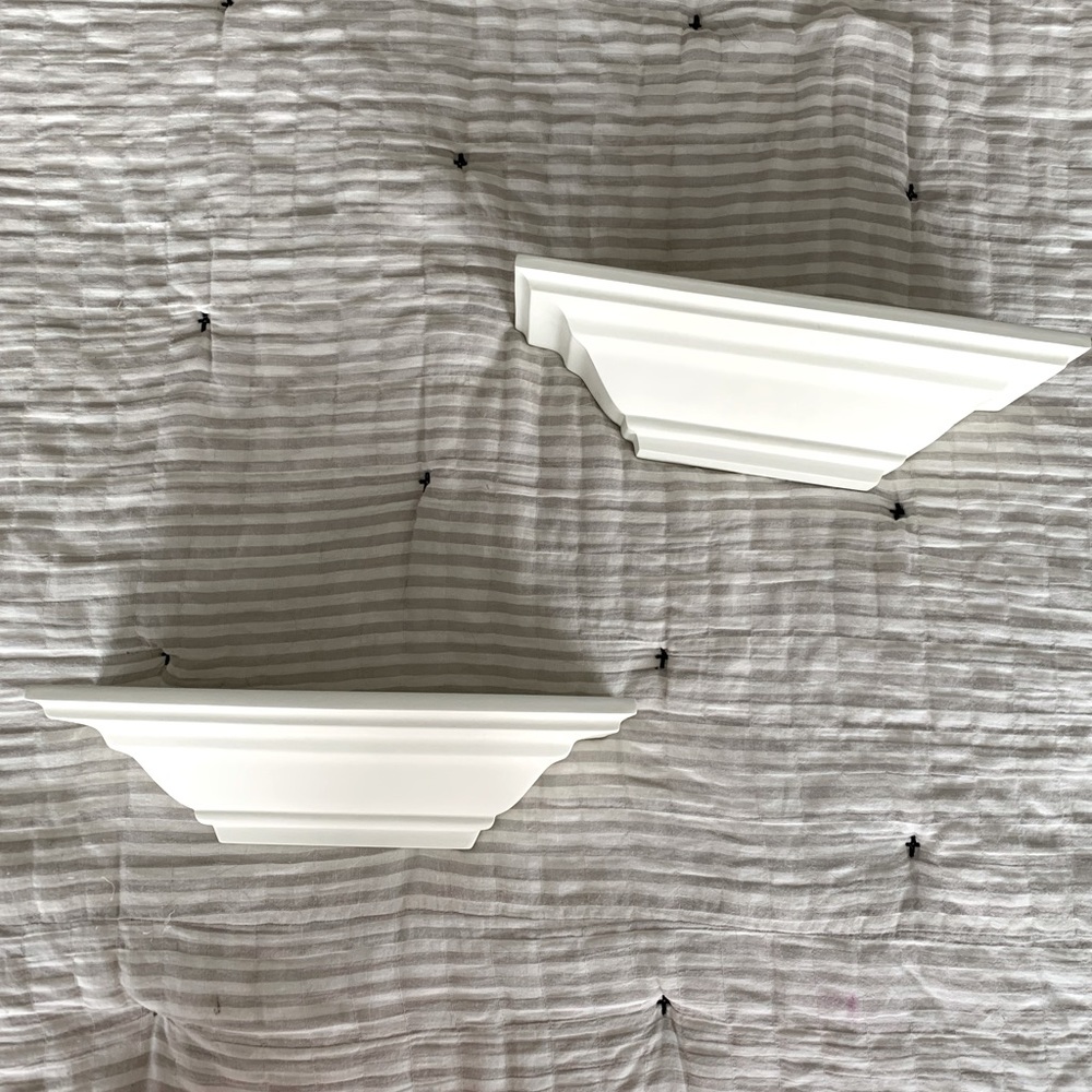 Set of two white wall shelves